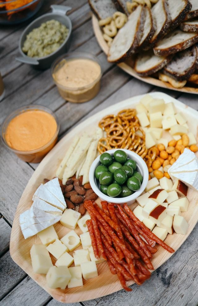 Cheese Board with Olives, Pretzels and Meat Sticks