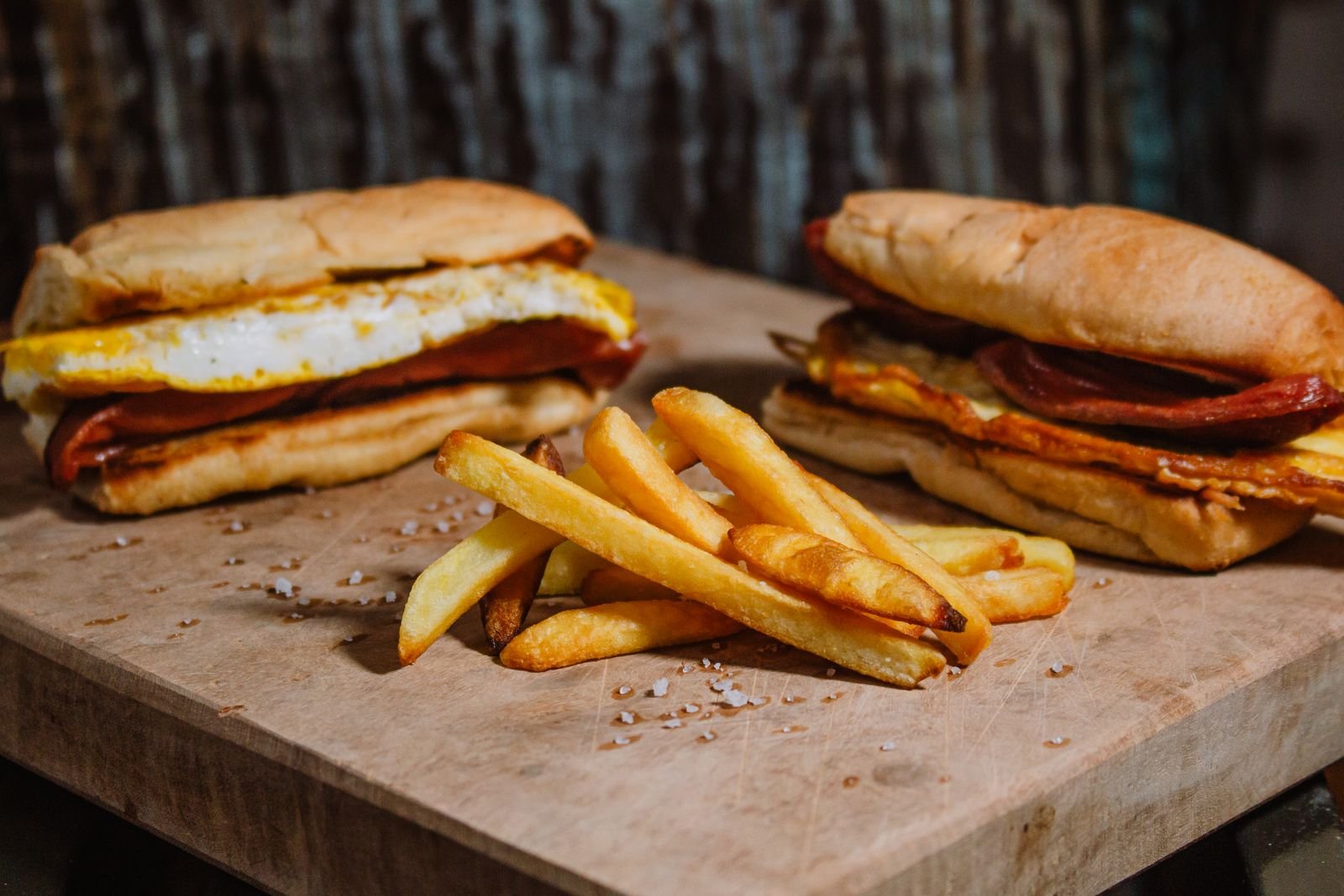 Fried Egg and Salami Sandwich Rolls with Fries