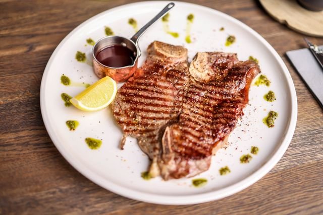 Grilled T-Bone Steak with Lemon and Herb Oil