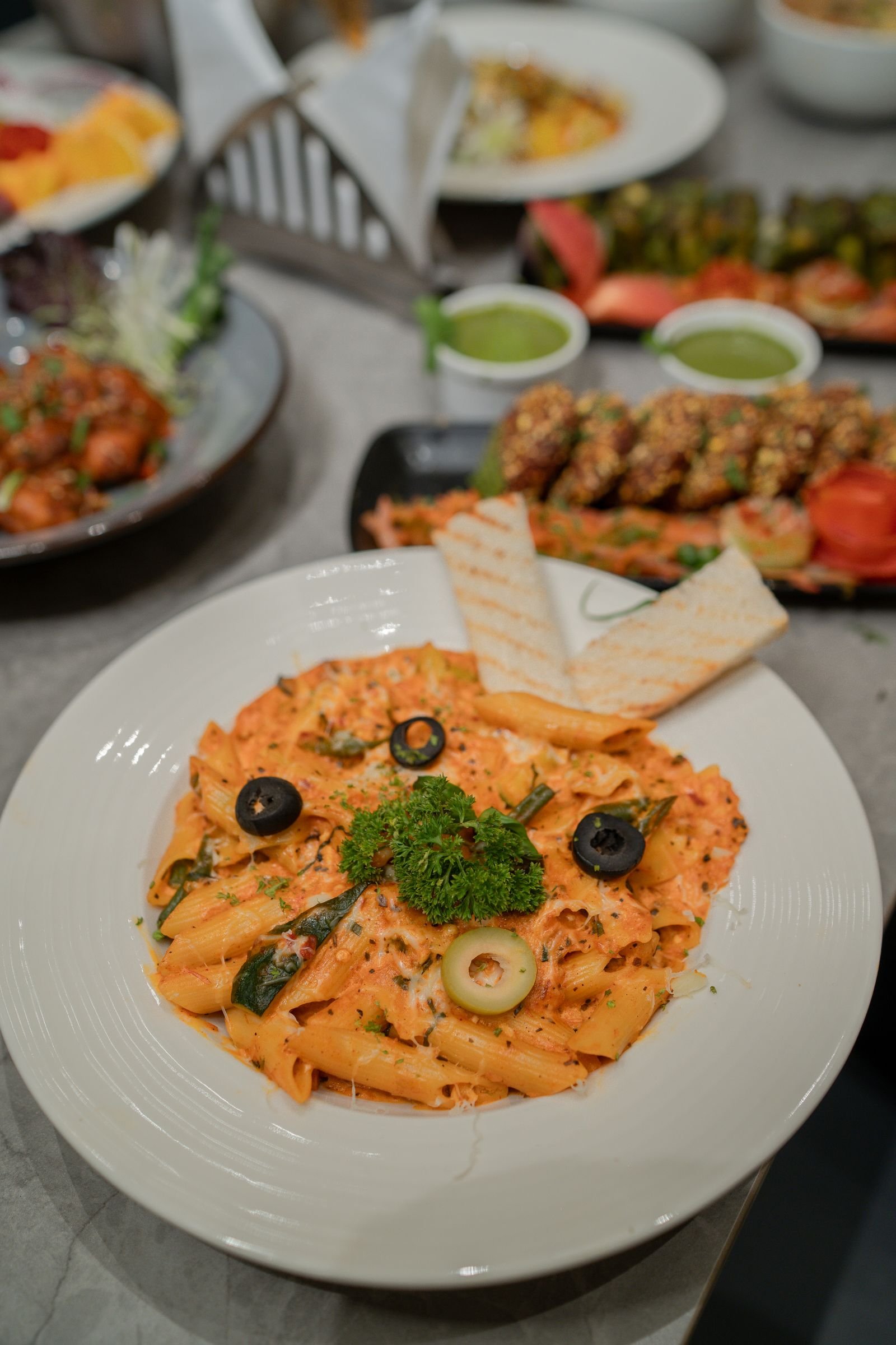 Penne Rosa with Olives and Parsley