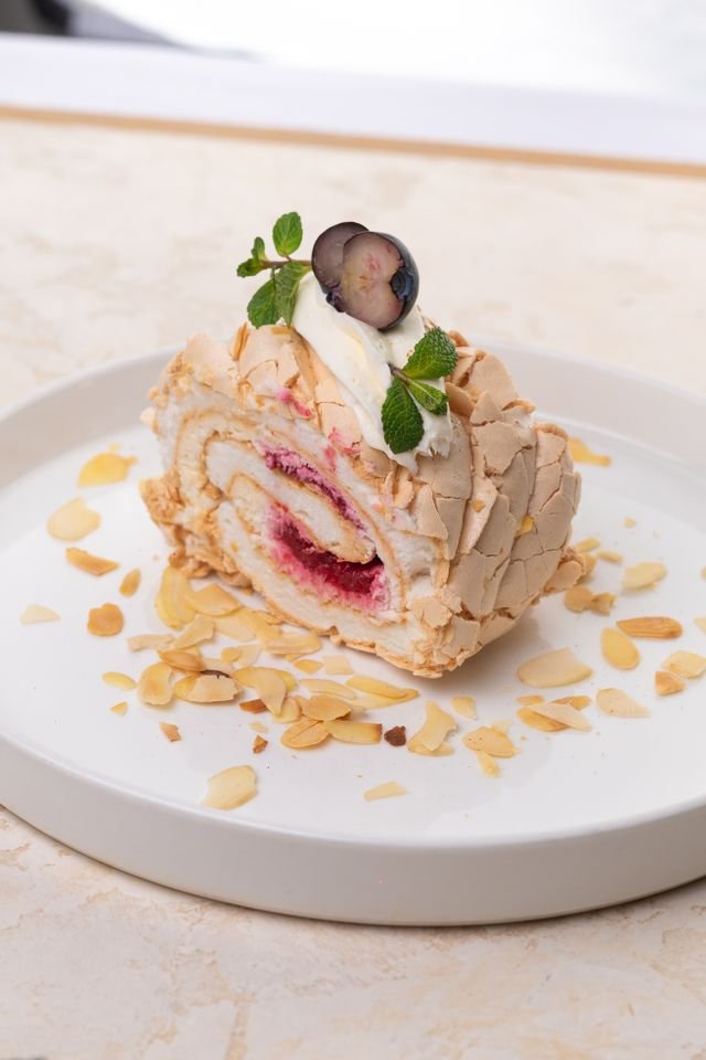 Raspberry Meringue Roulade with Almonds