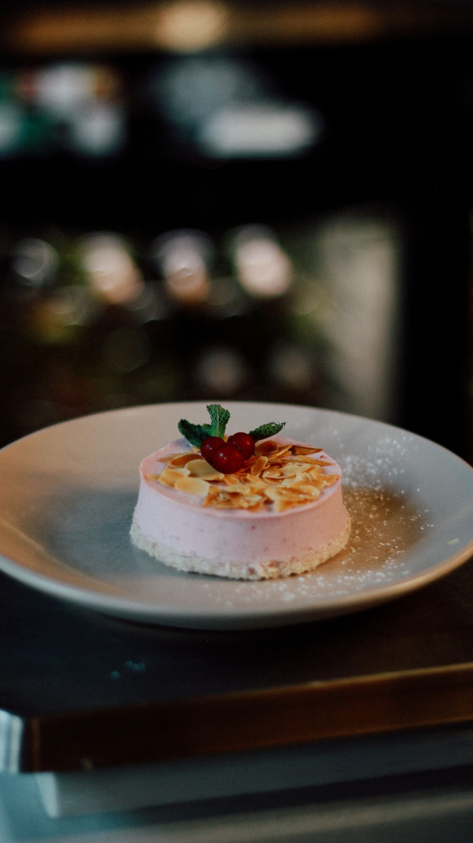 Raspberry Mousse Cake with Toasted Almonds