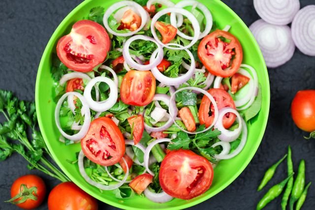 Tomato and Onion Ring Salad with Fresh Greens