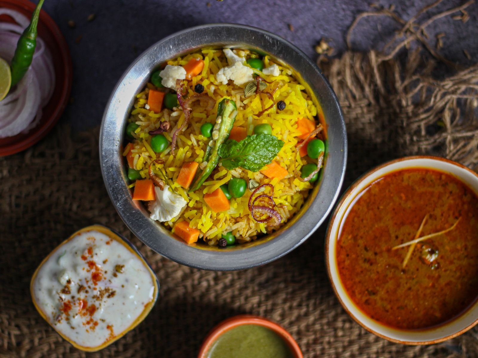Vegetable Biryani with Raita and Curry Sauce