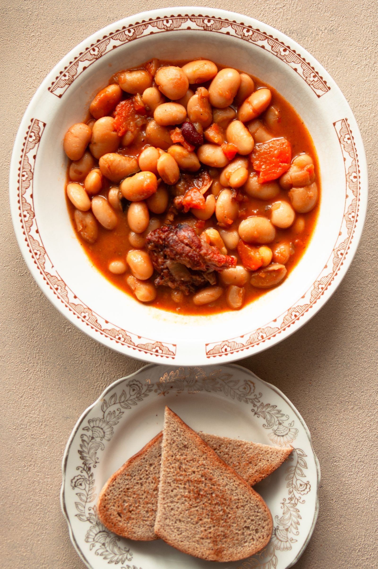 White Bean and Tomato Stew with Smoked Meat