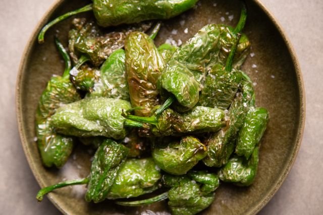 Blistered padron peppers